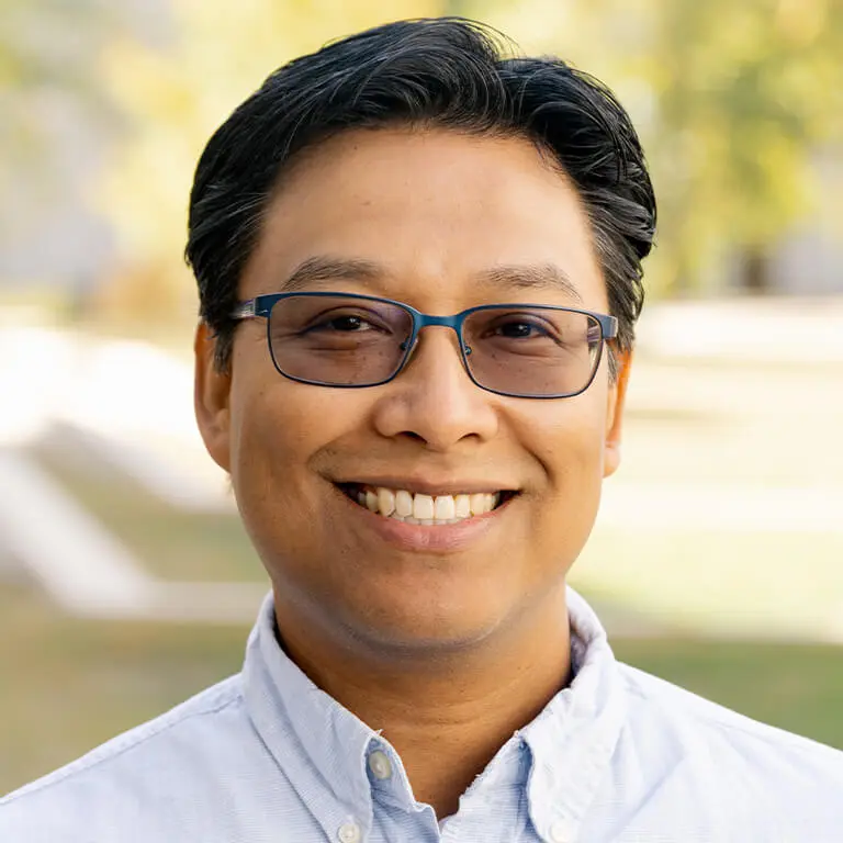 Alonso Saldivar smiling for the camera