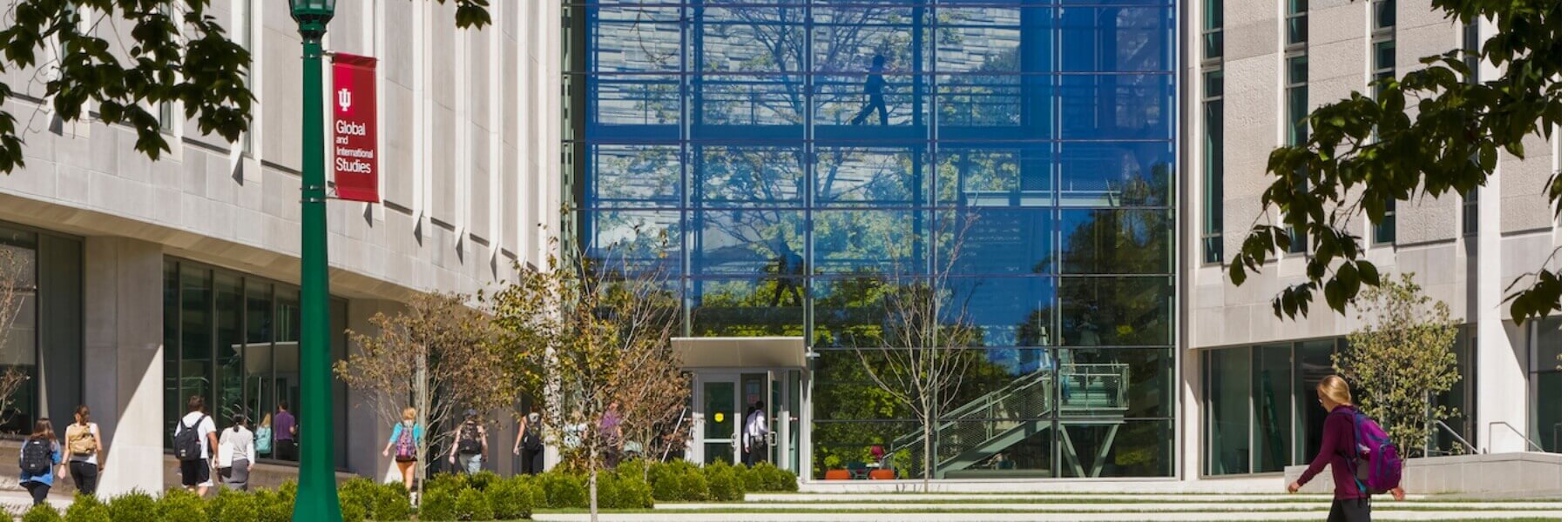 Students are walking towards the Global and International Studies building.