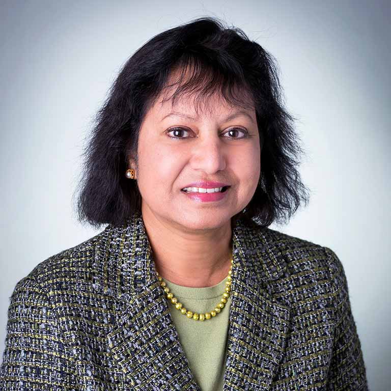 A headshot of Asma Afsaruddin. 