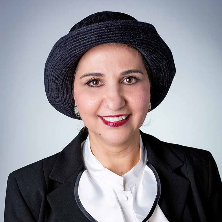 A headshot of Iman Almaradan. 