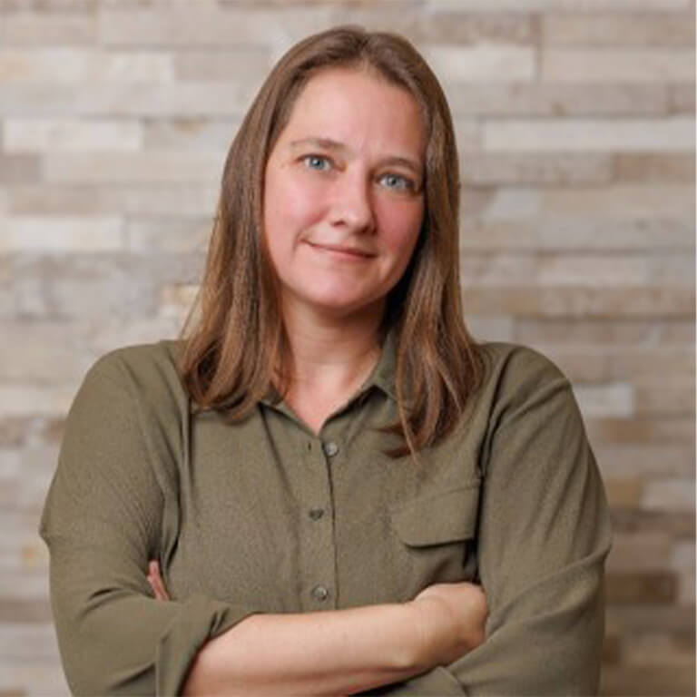 Karen Stoll Farrell posing for the camera.